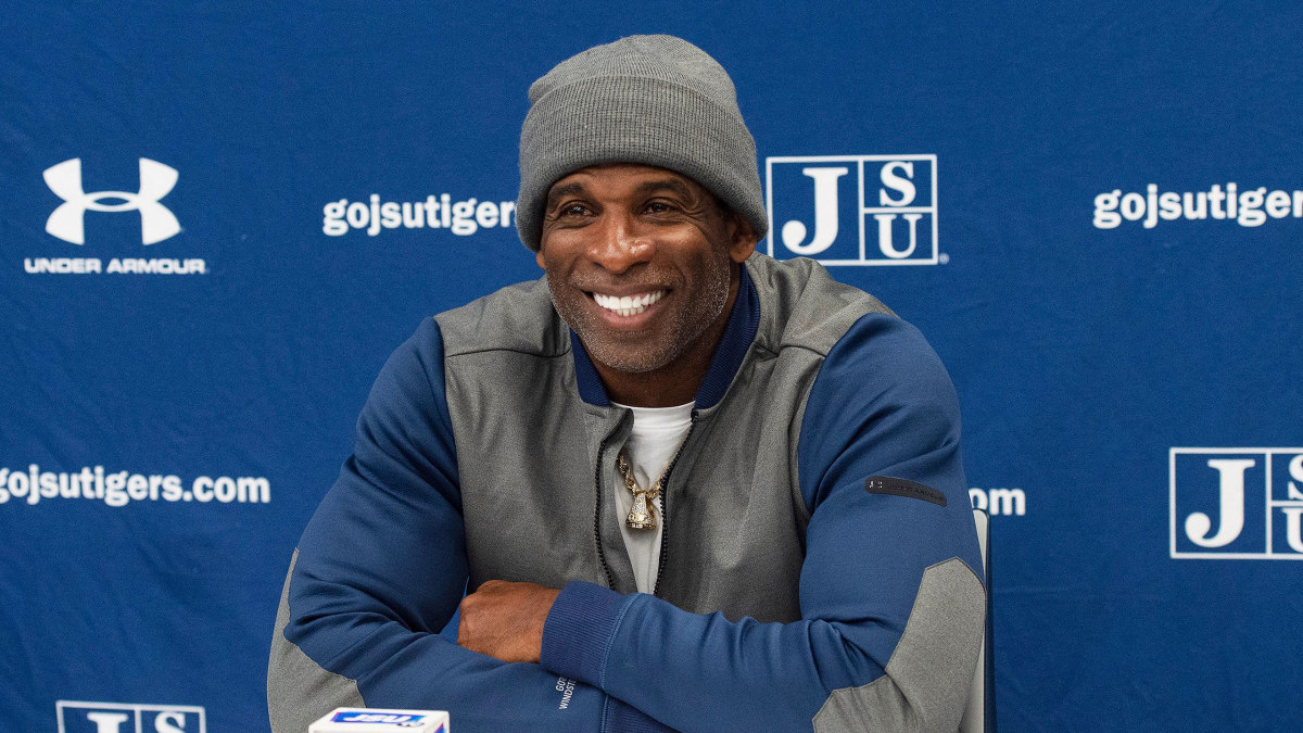 Jackson State coach Deion Sanders talks to the media